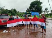 Jelang Hari Kemerdekaan, Polda Maluku Dan Pemuda ALMUKMIN Ambon Bagikan Bendera Merah Putih
